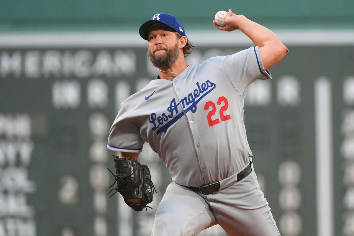 Jul 26, 2025; Boston, Massachusetts, USA; Los Angeles Dodgers starting pitcher Clayton Kershaw (22) pitches  during the first inning against the Boston Red Sox at Fenway Park. Mandatory Credit: Bob DeChiara-Imagn Images