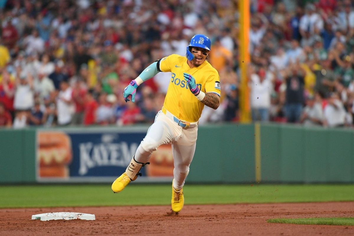 Jul 26, 2025; Boston, Massachusetts, USA; Boston Red Sox left fielder Jarren Duran (16) runs to third for a triple during the second inning against the Los Angeles Dodgers at Fenway Park. Mandatory Credit: Bob DeChiara-Imagn Images