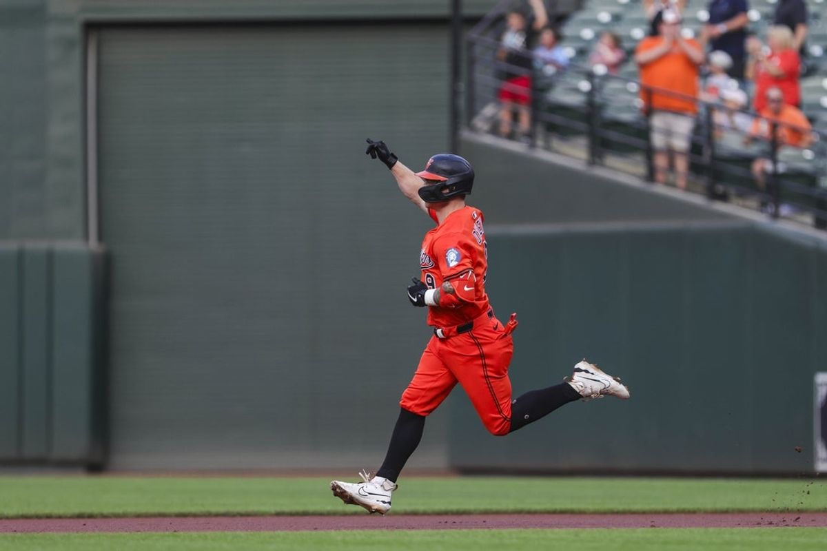 Jul 26, 2025; Baltimore, Maryland, USA;  Baltimore Orioles’ designated hitter Tyler O'Neill (9) celebrates his home run against the Colorado Rockies’ in second inning at Oriole Park at Camden Yards. Mandatory Credit: Lexi Thompson-Imagn Images
