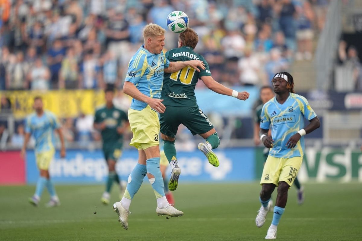 Jul 26, 2025; Chester, Pennsylvania, USA; Philadelphia Union defender Jakob Glesnes (5) and Colorado Rapids midfielder Djordje Mihailovic (10) jump for a header in the first half at Subaru Park. Mandatory Credit: Kyle Ross-Imagn Images