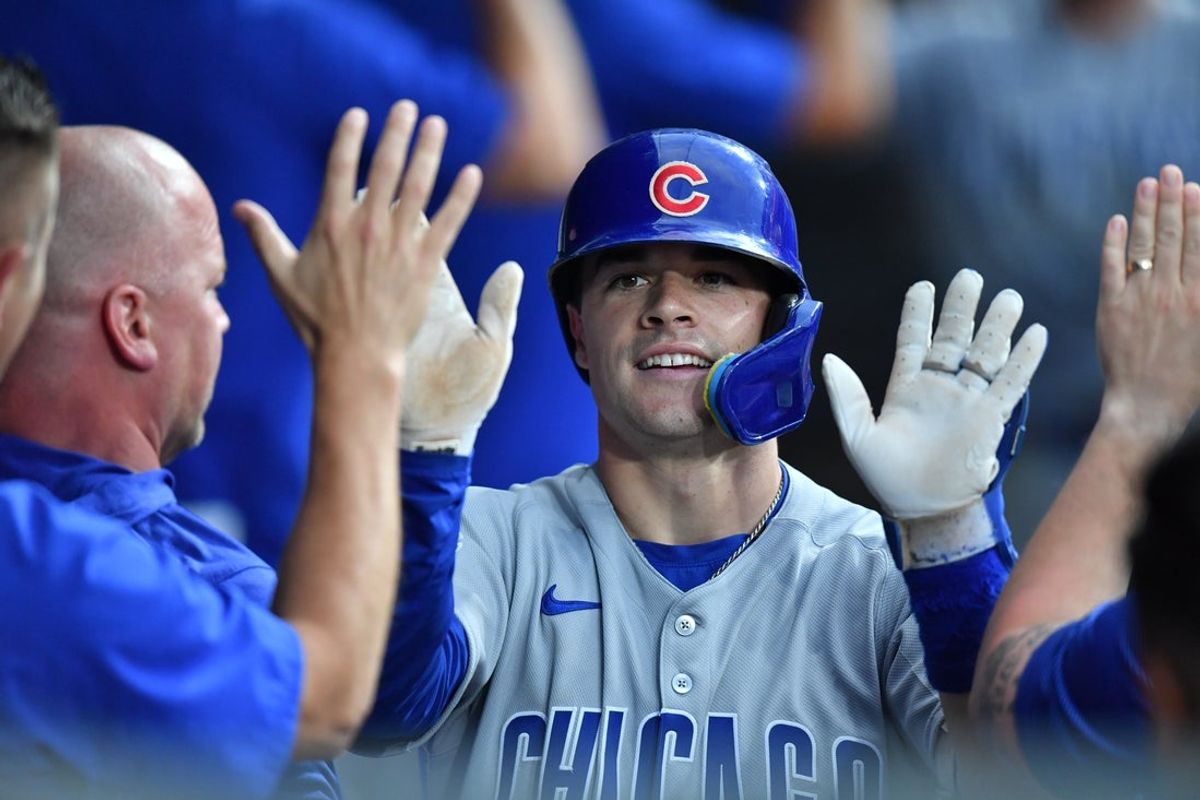 Jul 26, 2025; Chicago, Illinois, USA; Chicago Cubs third baseman Matt Shaw (6) celebrates his two-run home run with teammates in the dugout during the seventh inning against the Chicago White Sox at Rate Field. Mandatory Credit: Patrick Gorski-Imagn Images