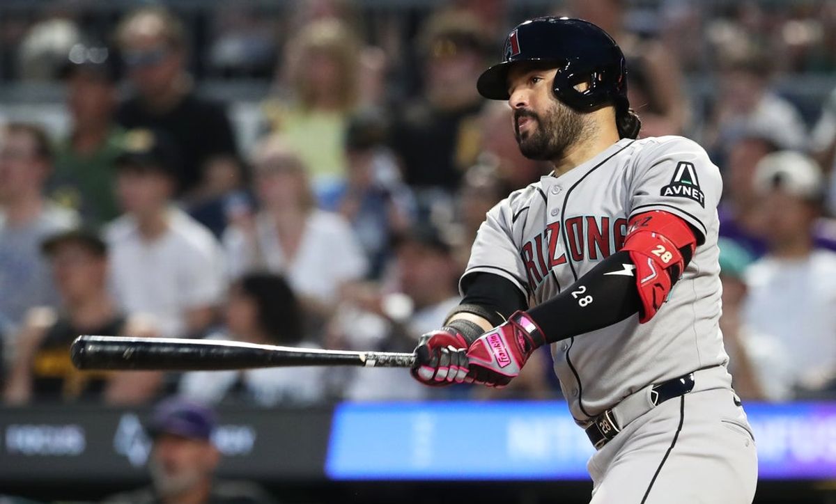 Jul 26, 2025; Pittsburgh, Pennsylvania, USA;  Arizona Diamondbacks third baseman Eugenio Suarez (28) hits a single against the Pittsburgh Pirates during the sixth inning at PNC Park. Mandatory Credit: Charles LeClaire-Imagn Images
