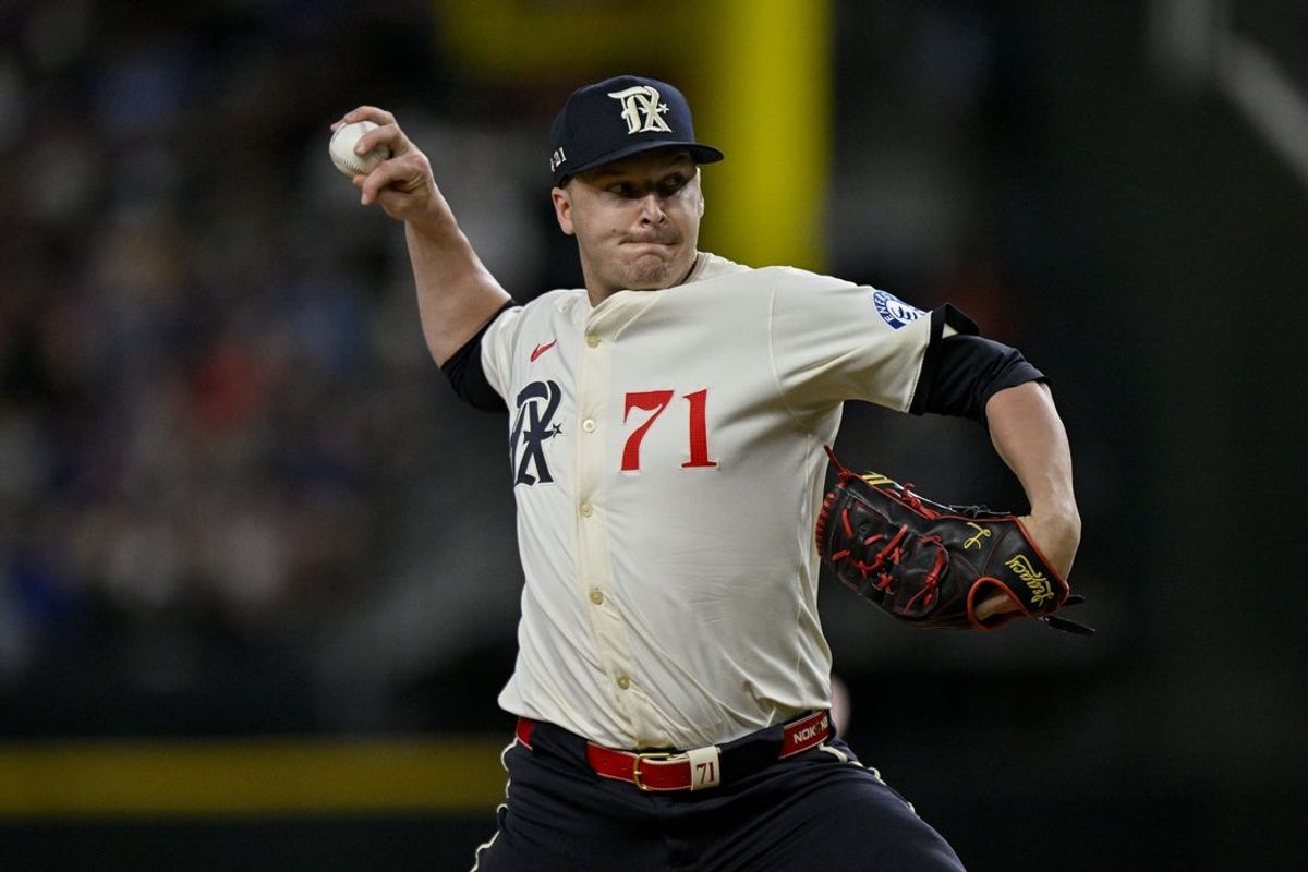 Jul 25, 2025; Arlington, Texas, USA; Texas Rangers relief pitcher Jacob Webb (71) in action during the game between the Texas Rangers and the Atlanta Braves at Globe Life Field. Mandatory Credit: Jerome Miron-Imagn Images