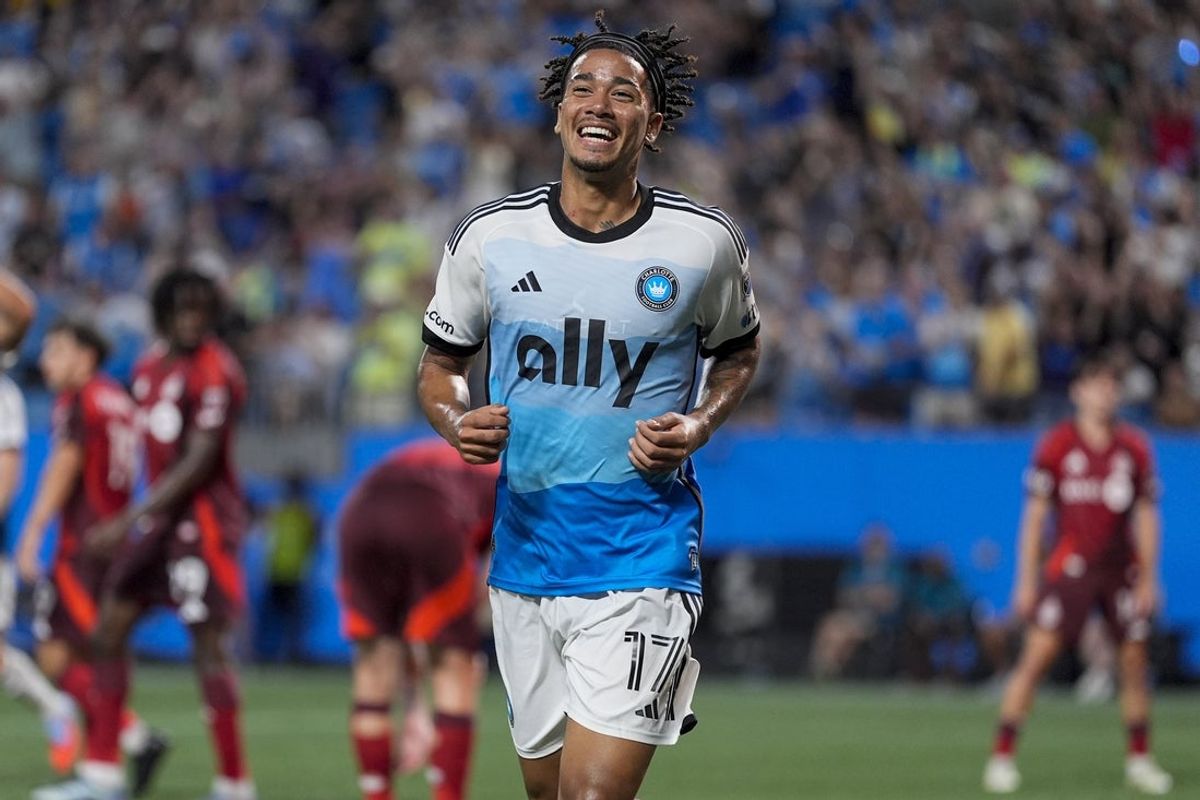 Jul 26, 2025; Charlotte, North Carolina, USA;  Charlotte FC forward Idan Toklomati (17) reacts to his goal during the second half against Toronto FC at Bank of America Stadium. Mandatory Credit: Jim Dedmon-Imagn Images