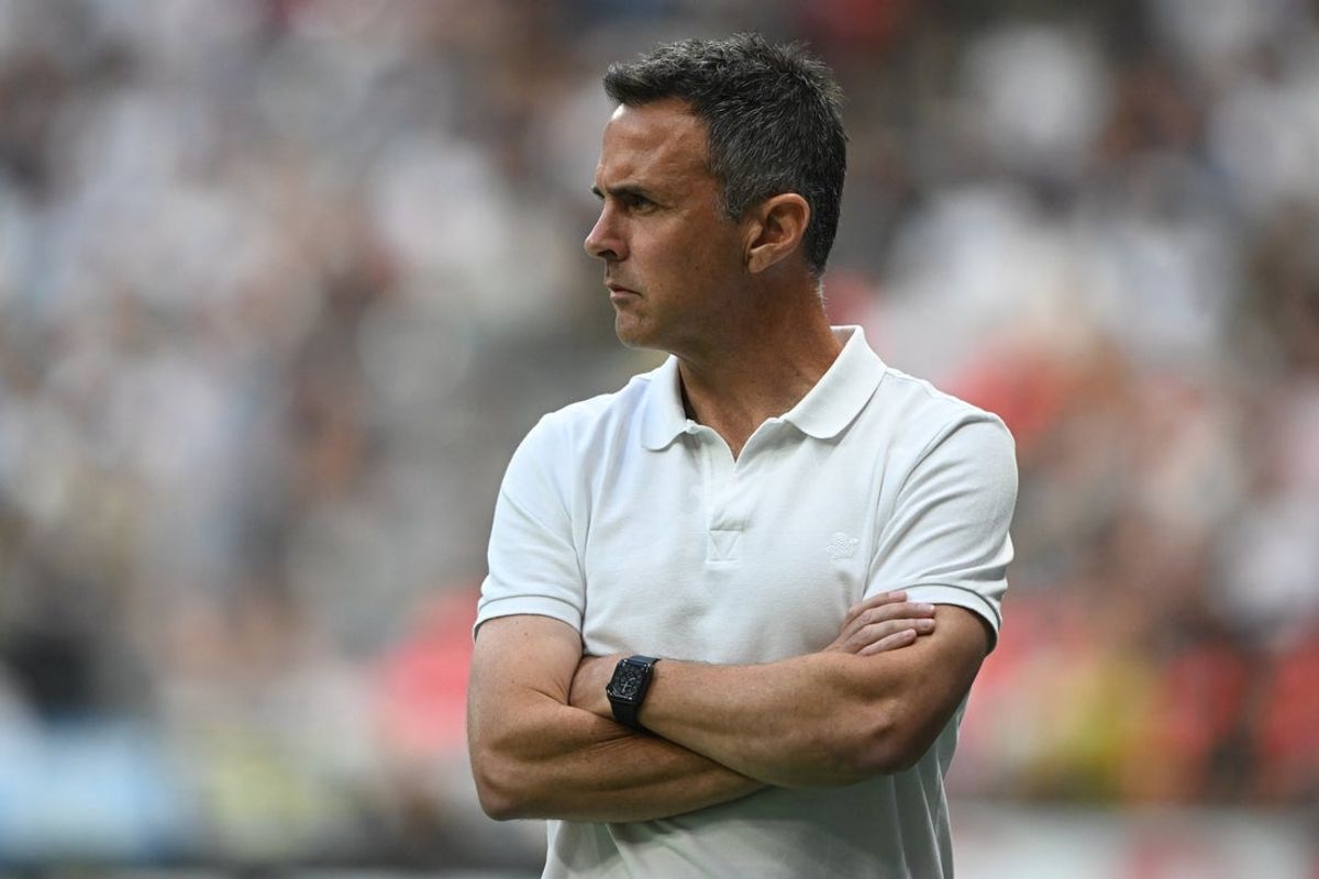 Jul 26, 2025; Vancouver, British Columbia, CAN;  Sporting Kansas City interim head coach Kerry Zavagnin looks on during the first half against the Vancouver Whitecaps at BC Place. Mandatory Credit: Anne-Marie Sorvin-Imagn Images