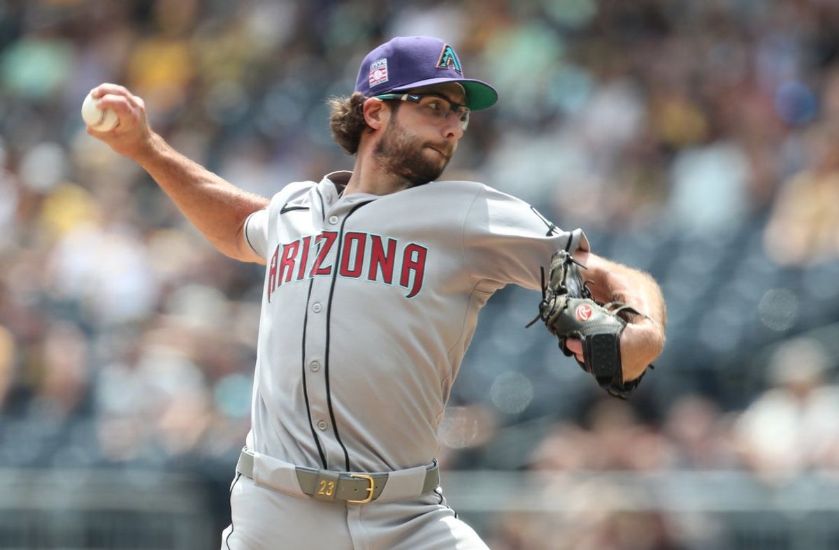Jul 27, 2025; Pittsburgh, Pennsylvania, USA;  Arizona Diamondbacks starting pitcher Zac Gallen (23) delivers a pitch against thePittsburgh Pirates during the first inning at PNC Park. Mandatory Credit: Charles LeClaire-Imagn Images