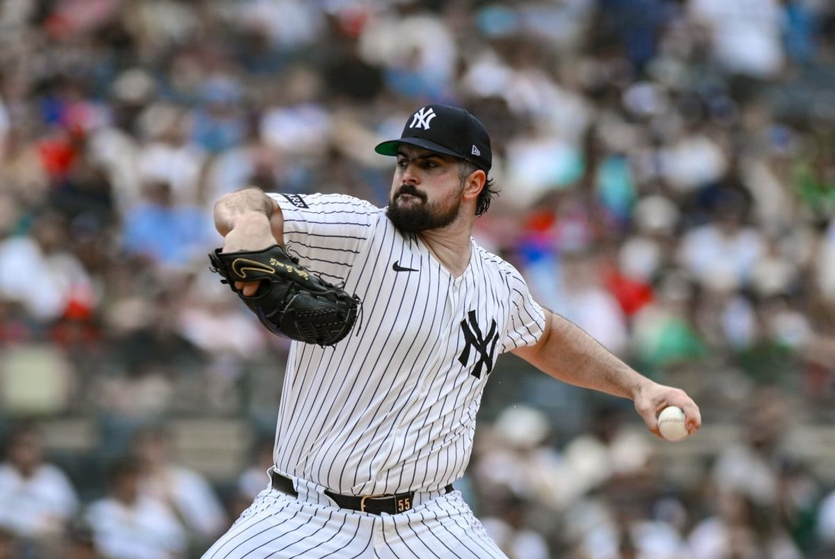 Jul 27, 2025; Bronx, New York, USA; New York Yankees pitcher Carlos Rodon (55) pitches against the Philadelphia Phillies during the first inning at Yankee Stadium. Mandatory Credit: John Jones-Imagn Images
