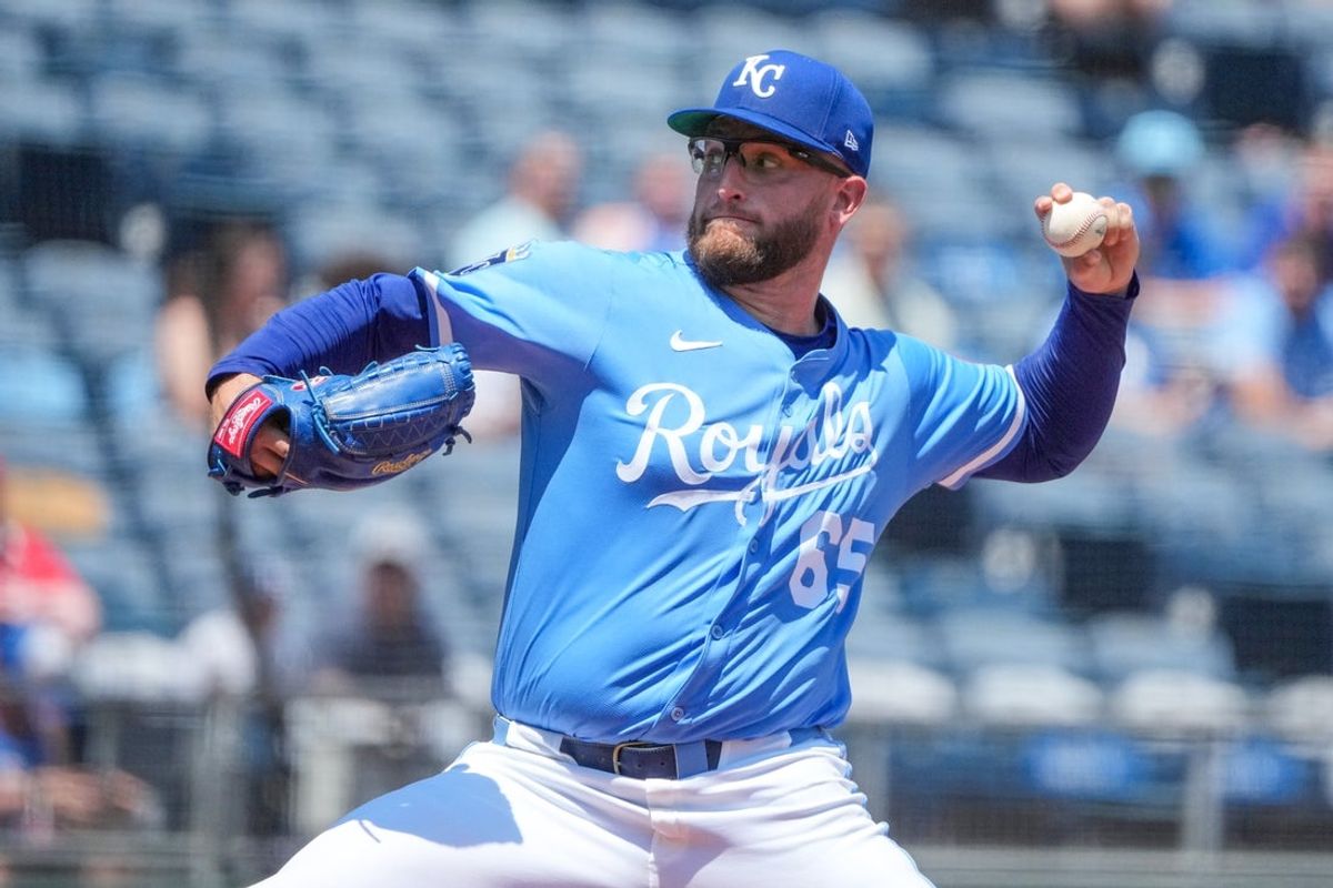 Jul 27, 2025; Kansas City, Missouri, USA; Kansas City Royals starting pitcher Noah Cameron (65) delivers a pitch agasint the Cleveland Guardians during the first inning at Kauffman Stadium. Mandatory Credit: Denny Medley-Imagn Images