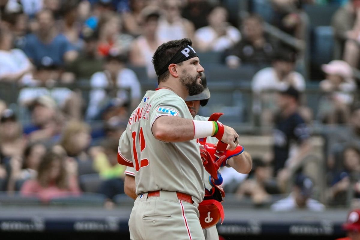 Jul 27, 2025; Bronx, New York, USA; Philadelphia Phillies outfielder Kyle Schwarber (12) reacts after striking out against the New York Yankees during the third inning at Yankee Stadium. Mandatory Credit: John Jones-Imagn Images