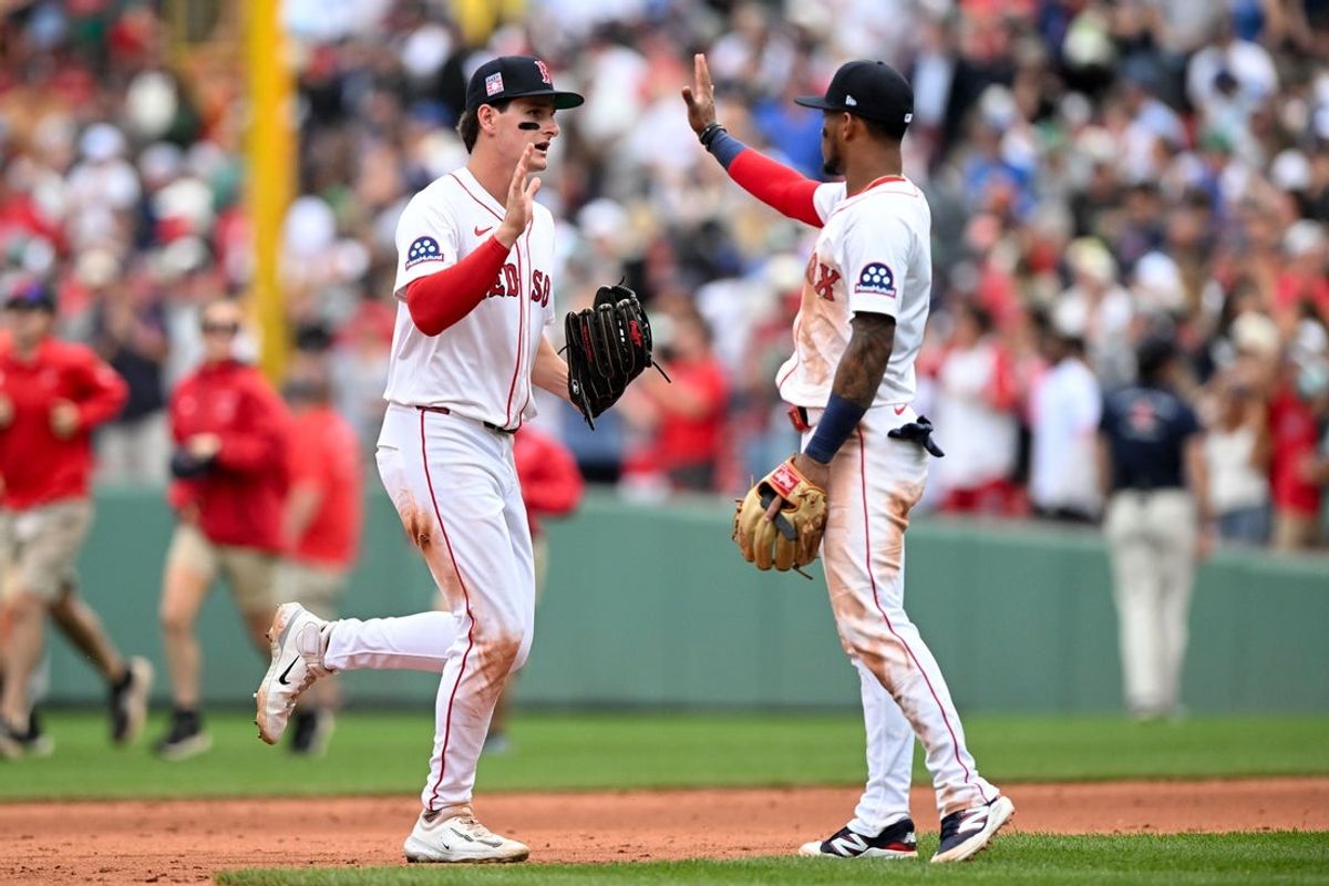 Jul 27, 2025; Boston, Massachusetts, USA; Boston Red Sox right fielder Roman Anthony (19) high-fives center fielder Ceddanne Rafaela (3) after a game against the Los Angeles Dodgers at Fenway Park. Mandatory Credit: Brian Fluharty-Imagn Images