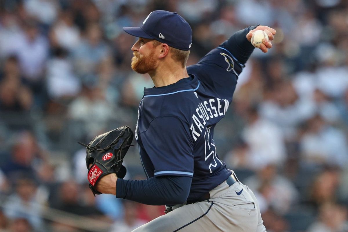 Jul 28, 2025; Bronx, New York, USA; Tampa Bay Rays starting pitcher Drew Rasmussen (57) delivers a pitch during the first inning against the New York Yankees at Yankee Stadium. Mandatory Credit: Vincent Carchietta-Imagn Images