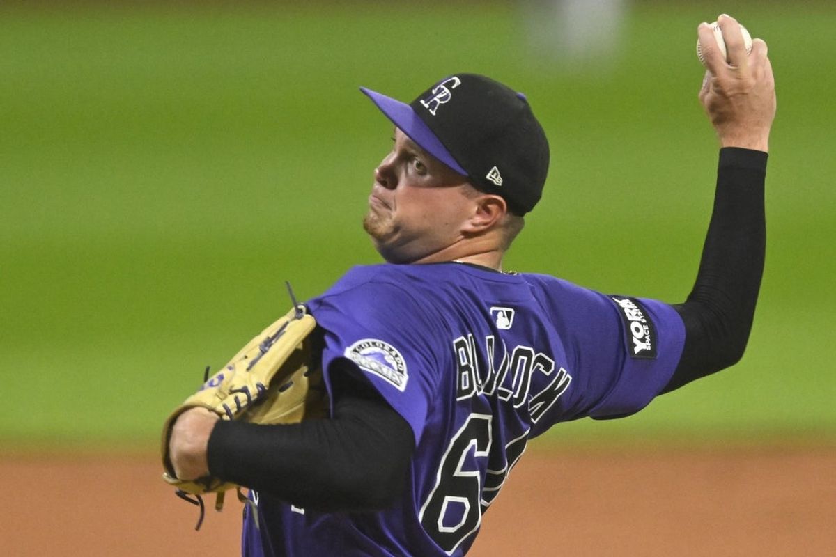 Jul 28, 2025; Cleveland, Ohio, USA; Colorado Rockies starting pitcher Bradley Blalock (64) delivers a pitch in the first inning against the Cleveland Guardians at Progressive Field. Mandatory Credit: David Richard-Imagn Images