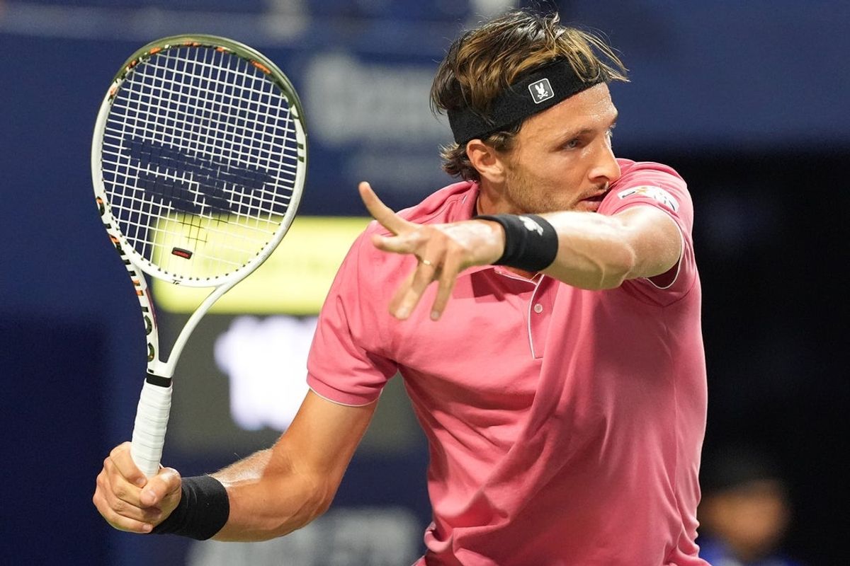 Jul 28, 2025; Toronto, ON, Canada; Arthur Rinderknech (FRA) sets up to return a ball to Alexis Galarneau (not pictured) during first round play at Sobeys Stadium. Mandatory Credit: John E. Sokolowski-Imagn Images