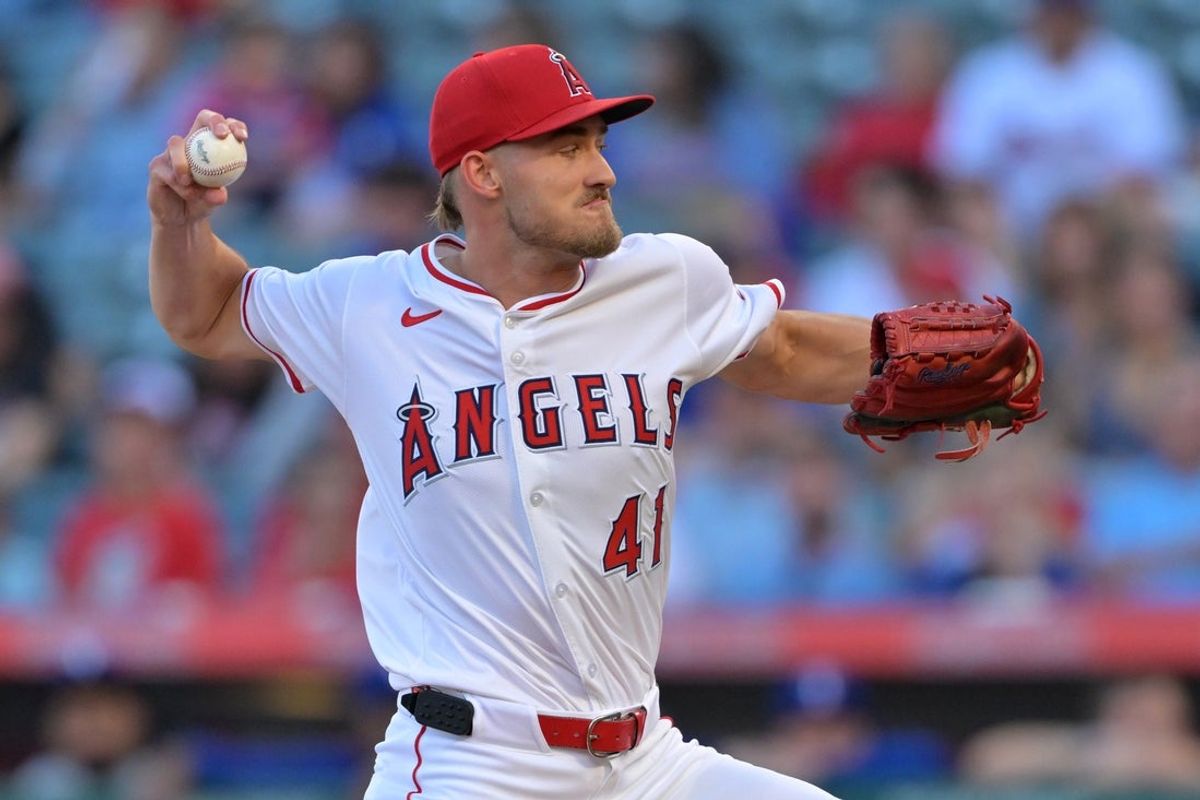 Jul 28, 2025; Anaheim, California, USA;  Los Angeles Angels starting pitcher Jack Kochanowicz (41) delivers to the plate during the first inning against the Texas Rangers at Angel Stadium. Mandatory Credit: Jayne Kamin-Oncea-Imagn Images