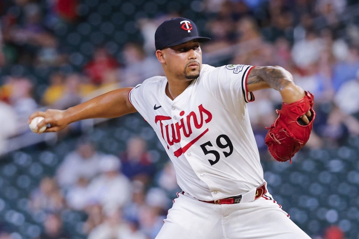Jul 28, 2025; Minneapolis, Minnesota, USA; Minnesota Twins relief pitcher Jhoan Duran (59) throws to the Boston Red Sox in the ninth inning at Target Field. Mandatory Credit: Bruce Kluckhohn-Imagn Images