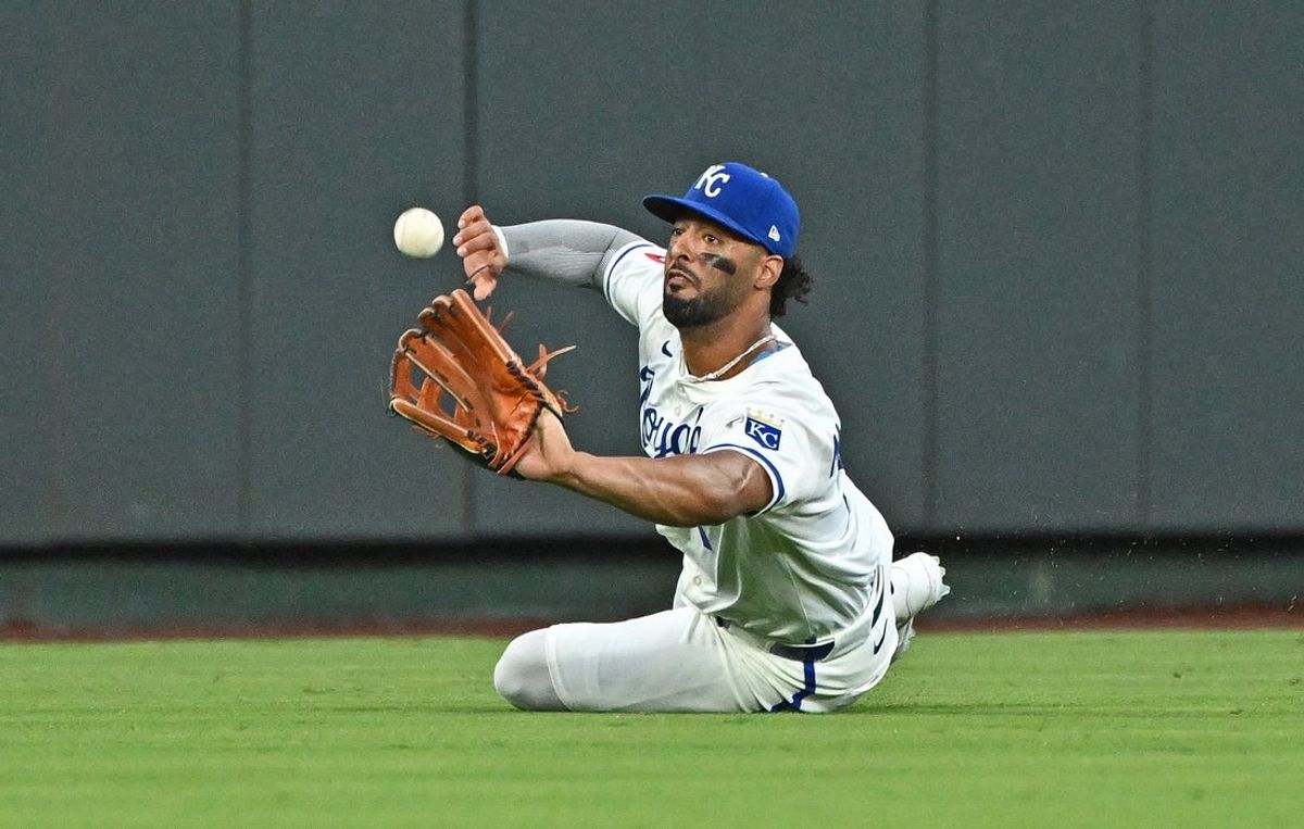Jul 28, 2025; Kansas City, Missouri, USA;  Kansas City Royals left fielder MJ Melendez (1) makes a diving attempt for a fly ball in the sixth inning against the Atlanta Braves at Kauffman Stadium. Mandatory Credit: Peter Aiken-Imagn Images