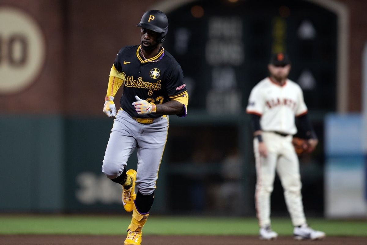 Jul 28, 2025; San Francisco, California, USA; Pittsburgh Pirates designated hitter Andrew McCutchen (22) runs out his two-run home run against the San Francisco Giants during the seventh inning at Oracle Park. Mandatory Credit: D. Ross Cameron-Imagn Images