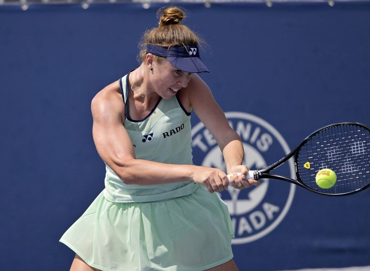 Jul 29, 2025; Montreal, QC, Canada; Linda Noskova (CZE) returns the ball against Jaqueline Cristian (ROU) in second round of play at IGA Stadium. Mandatory Credit: Eric Bolte-Imagn Images