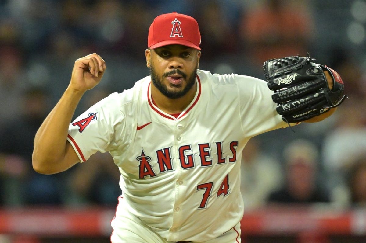 Jul 28, 2025; Anaheim, California, USA; Los Angeles Angels relief pitcher Kenley Jansen (74) earns a save against the Texas Rangers in the ninth inning at Angel Stadium. Mandatory Credit: Jayne Kamin-Oncea-Imagn Images