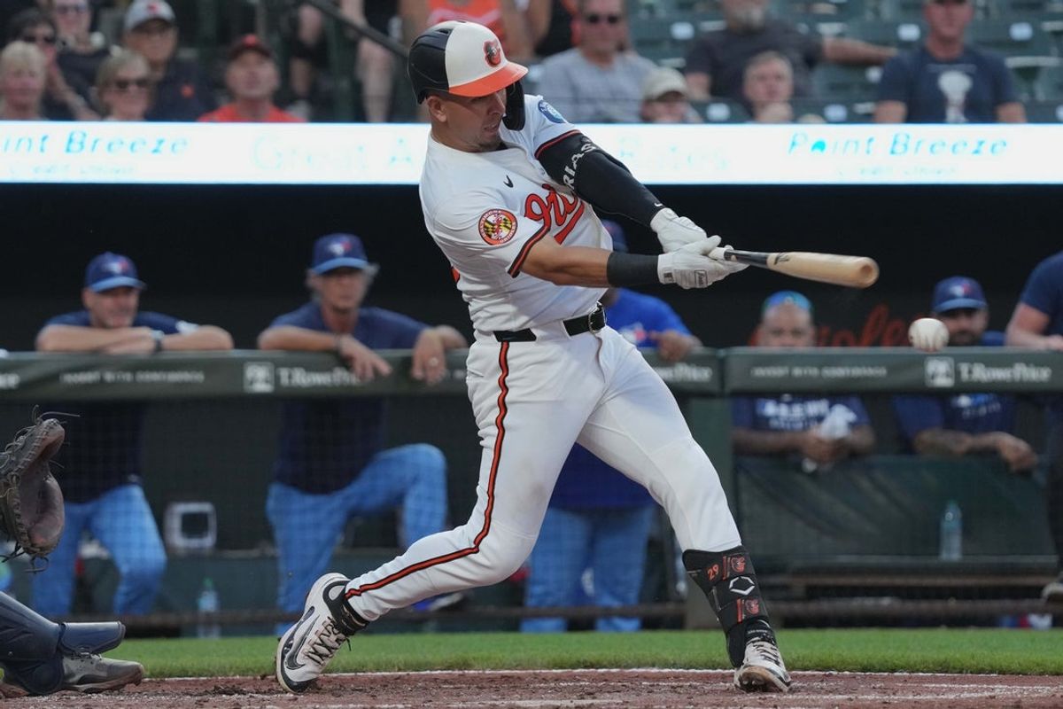 Jul 29, 2025; Baltimore, Maryland, USA; Baltimore Orioles third baseman Ramon Urias (29) grounds out to drive in a run during the fourth inning against the Toronto Blue Jays at Oriole Park at Camden Yards. Mandatory Credit: Mitch Stringer-Imagn Images