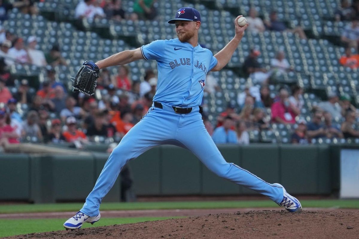 Jul 29, 2025; Baltimore, Maryland, USA; Toronto Blue Jays pitcher Eric Lauer (56) delivers during the second inning against the Baltimore Orioles at Oriole Park at Camden Yards. Mandatory Credit: Mitch Stringer-Imagn Images