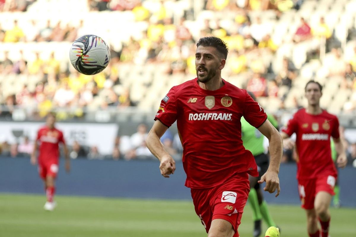 Jul 29, 2025; Columbus, Ohio, USA;  Toluca FC forward Paulinho (26) runs down the ball during the first half against the Columbus Crew at Lower.com Field. Mandatory Credit: Joseph Maiorana-Imagn Images
