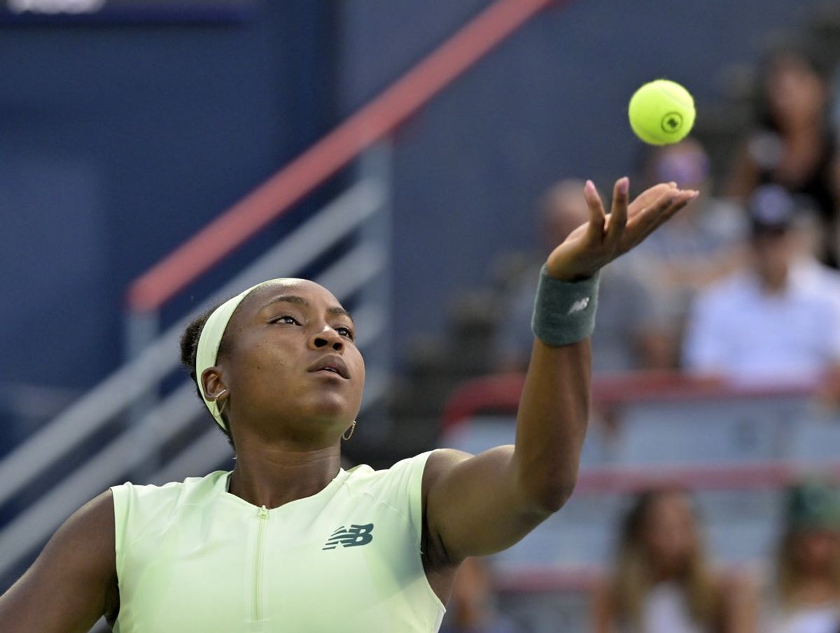 Jul 29, 2025; Montreal, QC, Canada; Coco Gauff (USA) serves against Danielle Collins (USA) in second round play at IGA Stadium. Mandatory Credit: Eric Bolte-Imagn Images