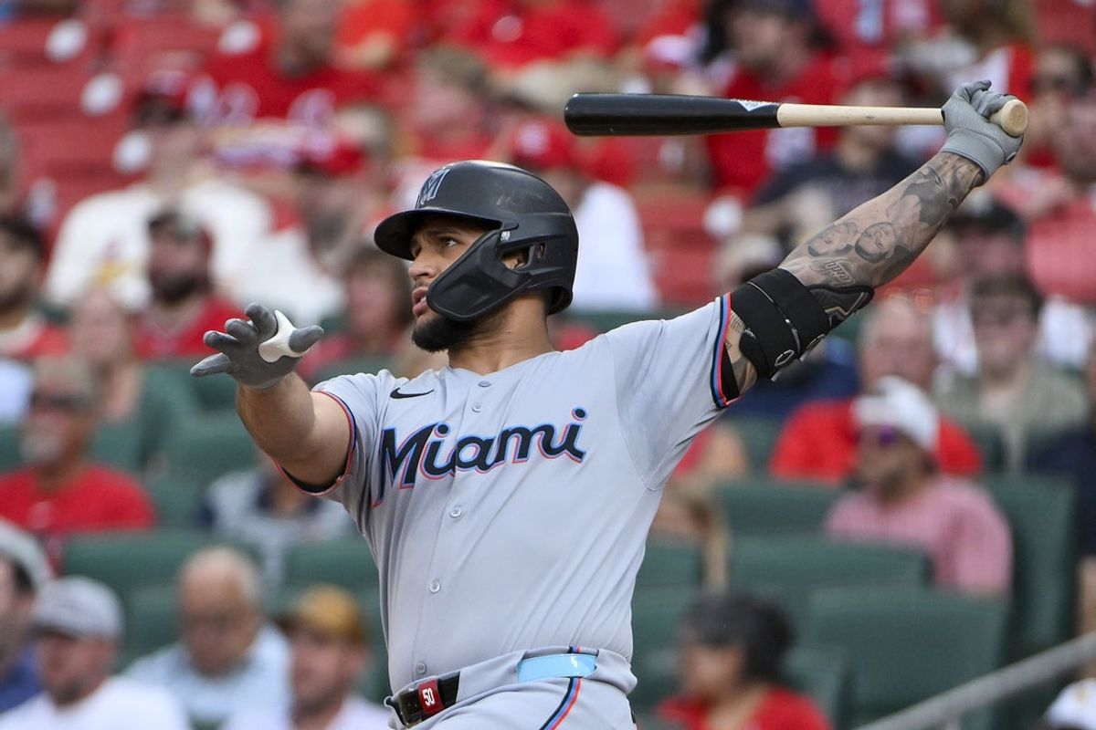 Jul 29, 2025; St. Louis, Missouri, USA;  Miami Marlins catcher Agustin Ramirez (50) hits a double against the St. Louis Cardinals during the first inning at Busch Stadium. Mandatory Credit: Jeff Curry-Imagn Images