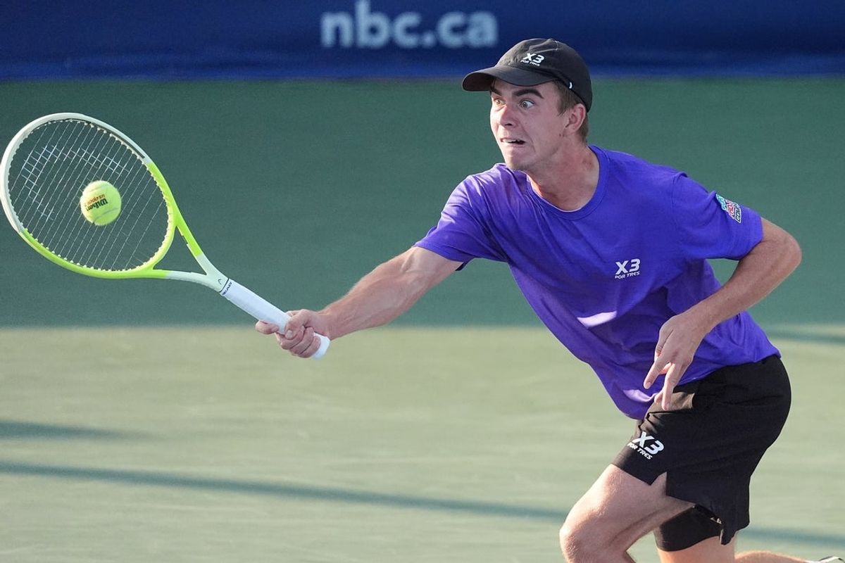 Jul 29, 2025; Toronto, ON, Canada; Dalibor Svrcina (CZE) hits a forehand to Daniil Medvedev (not pictured) during the second round at Sobeys Stadium. Mandatory Credit: John E. Sokolowski-Imagn Images