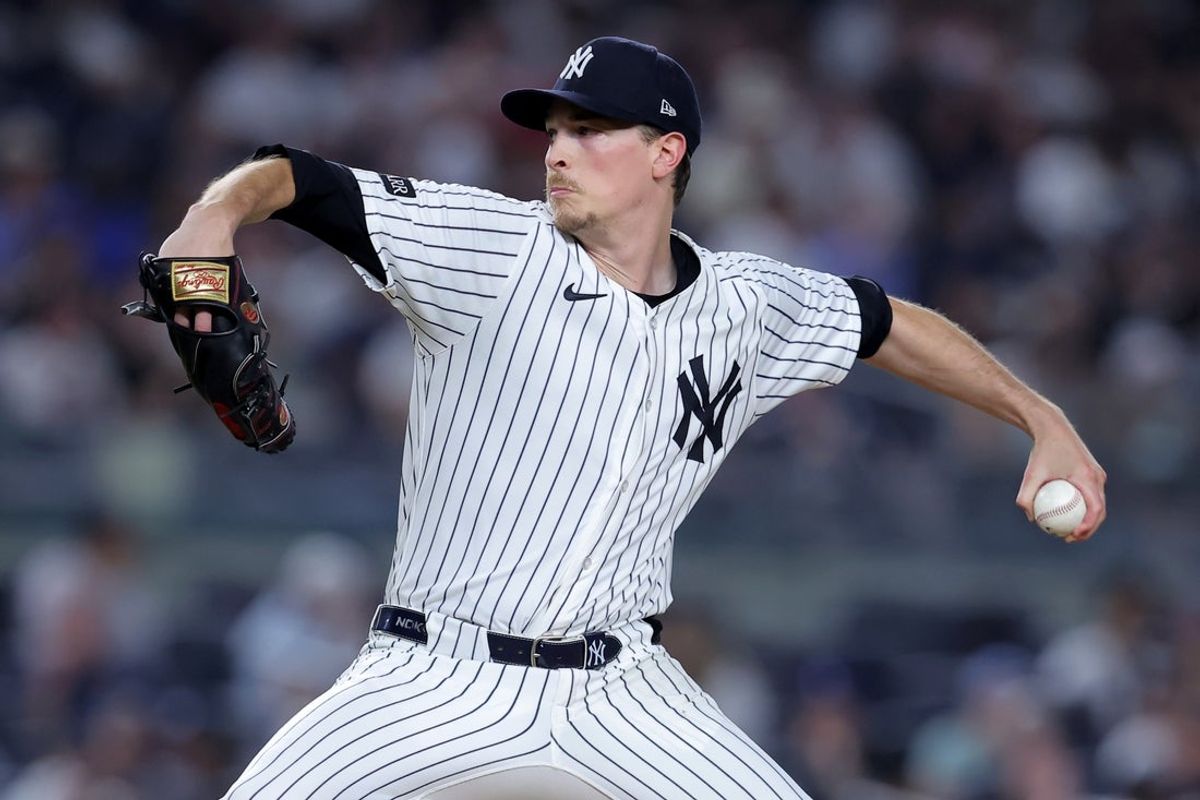 Jul 29, 2025; Bronx, New York, USA; New York Yankees starting pitcher Max Fried (54) pitches against the Tampa Bay Rays during the sixth inning at Yankee Stadium. Mandatory Credit: Brad Penner-Imagn Images