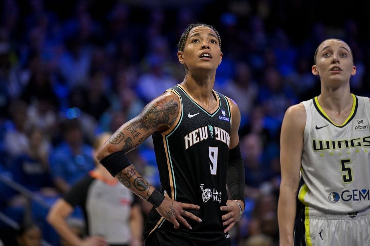 Jul 28, 2025; Arlington, Texas, USA; New York Liberty guard Natasha Cloud (9) during the game between the Dallas Wings and the New York Liberty at College Park Center. Mandatory Credit: Jerome Miron-Imagn Images