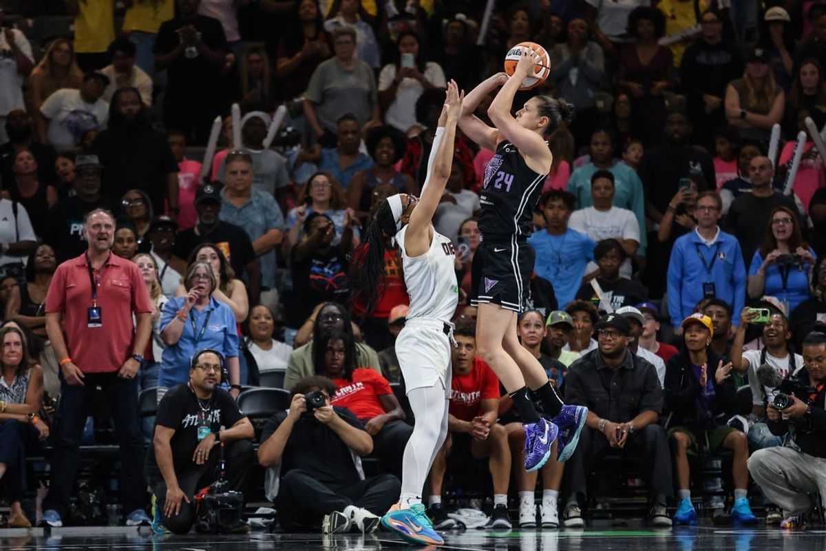 Jul 29, 2025; College Park, Georgia, USA; Golden State Valkyries forward Cecilia Zandalasini (24) shoots the ball over Atlanta Dream guard Allisha Gray (15) during the fourth quarter at Gateway Center Arena at College Park. Mandatory Credit: Jordan Godfree-Imagn Images