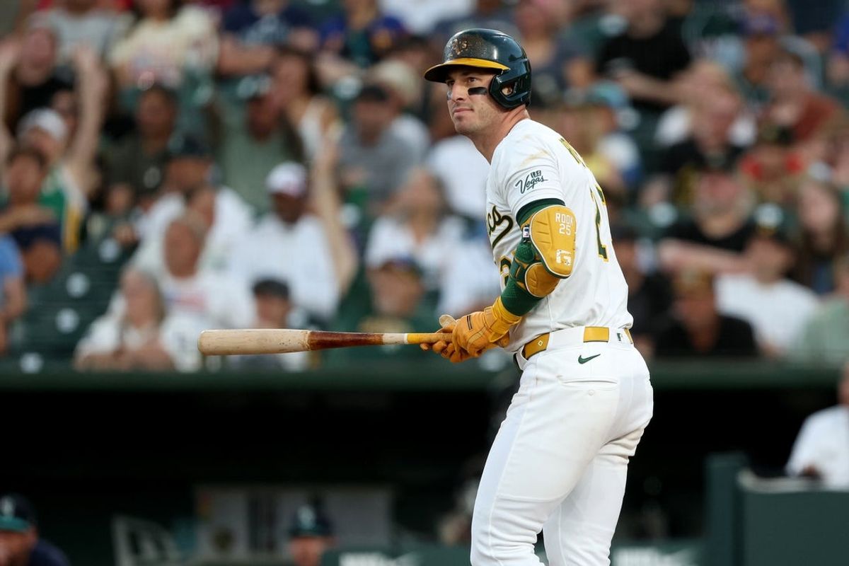 Jul 29, 2025; West Sacramento, California, USA; Athletics designated hitter Brent Rooker (25) watches the ball after hitting a three run home run against the Seattle Mariners during the third inning  at Sutter Health Park. Mandatory Credit: Dennis Lee-Imagn Images
