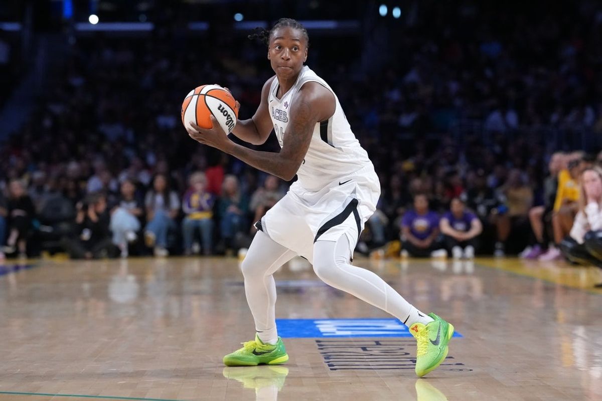Jul 29, 2025; Los Angeles, California, USA; Las Vegas Aces guard Jewell Loyd (24) against the LA Sparks in the second half at the Crypto.com Arena. Mandatory Credit: Kirby Lee-Imagn Images
