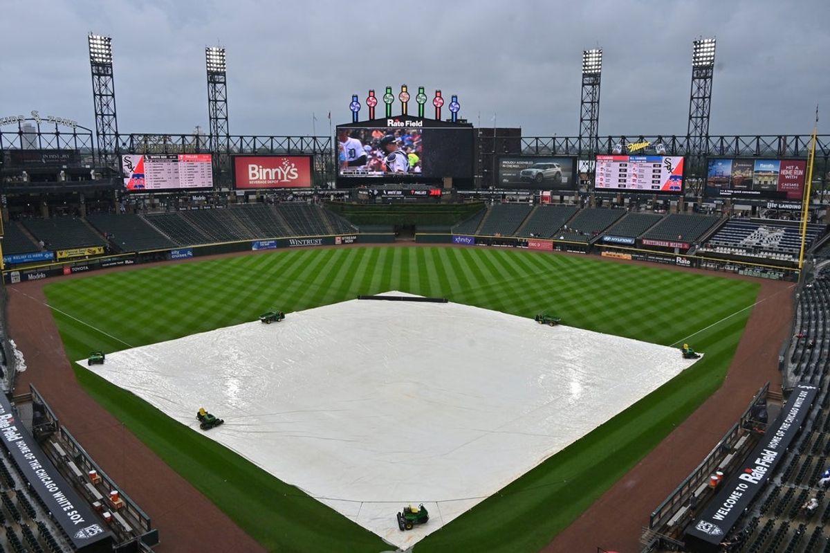 Jul 30, 2025; Chicago, Illinois, USA; A general view of the tarp during a rain delay before a game against the Philadelphia Phillies and the Chicago White Sox at Rate Field. Mandatory Credit: Patrick Gorski-Imagn Images