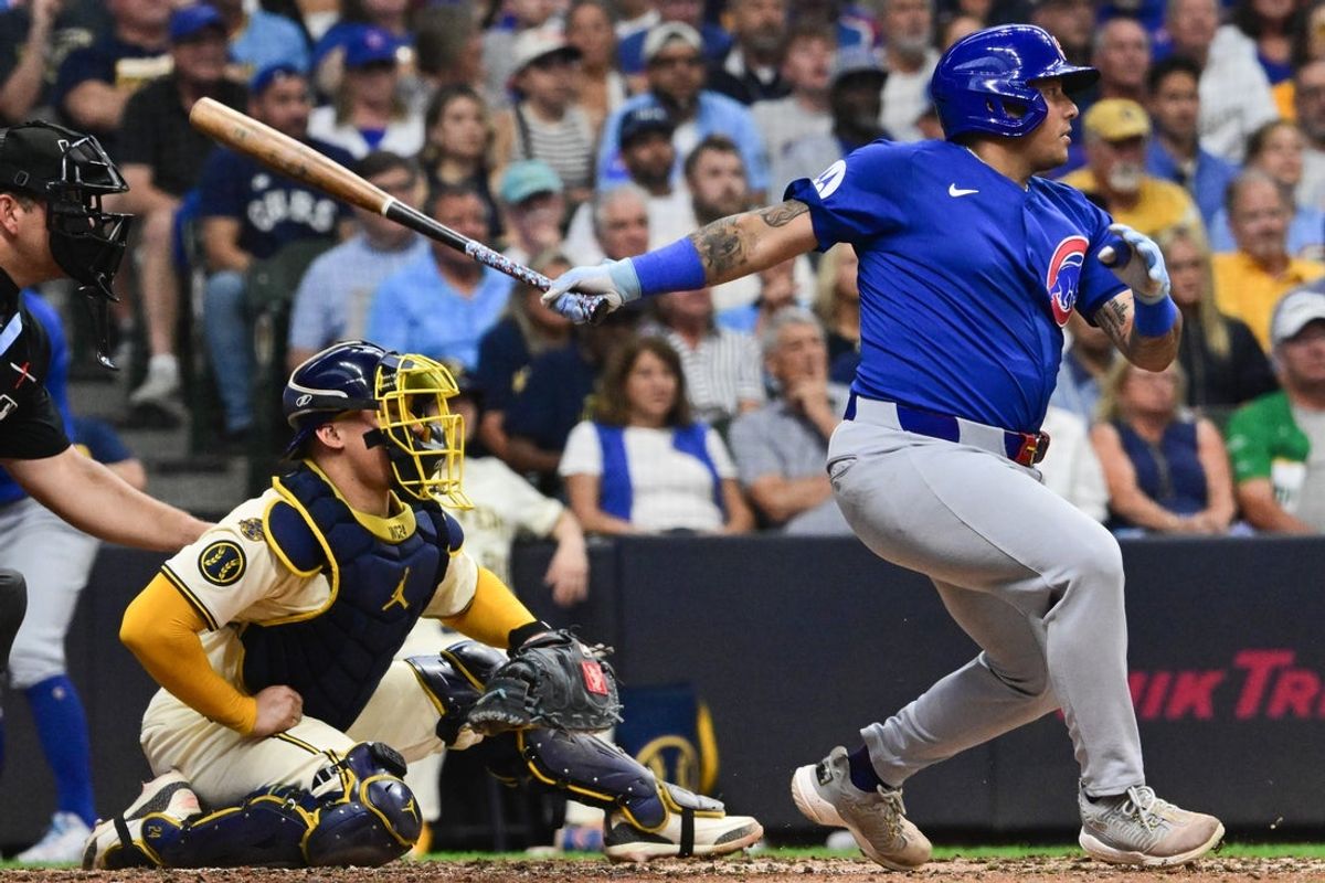 Jul 30, 2025; Milwaukee, Wisconsin, USA; Chicago Cubs designated hitter Moises Ballesteros (25) hits a double to drive in three runs in the third inning against the Milwaukee Brewers at American Family Field. Mandatory Credit: Benny Sieu-Imagn Images