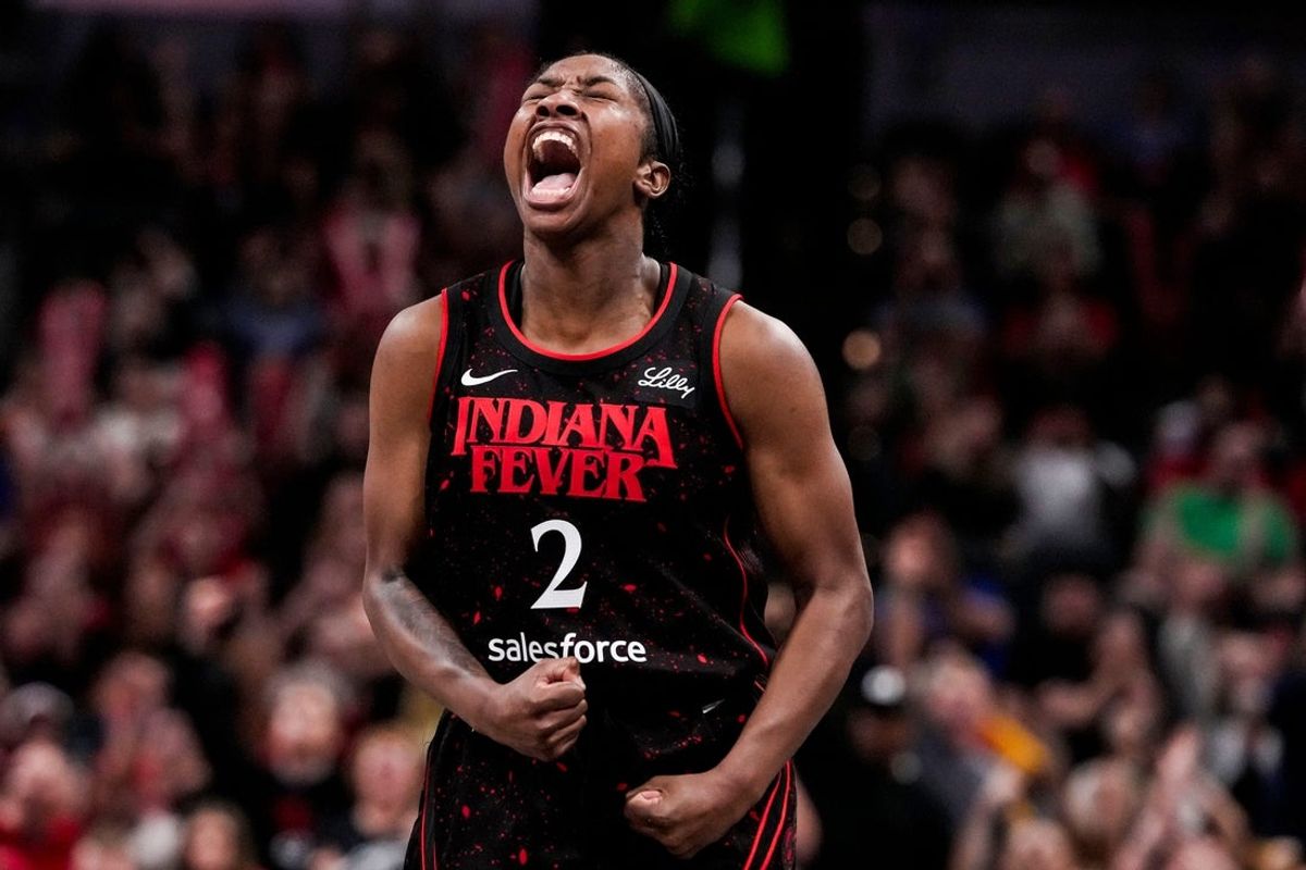 Indiana Fever guard Aari McDonald (2) yells in excitement Wednesday, July 30, 2025, during the game at Gainbridge Fieldhouse in Indianapolis.