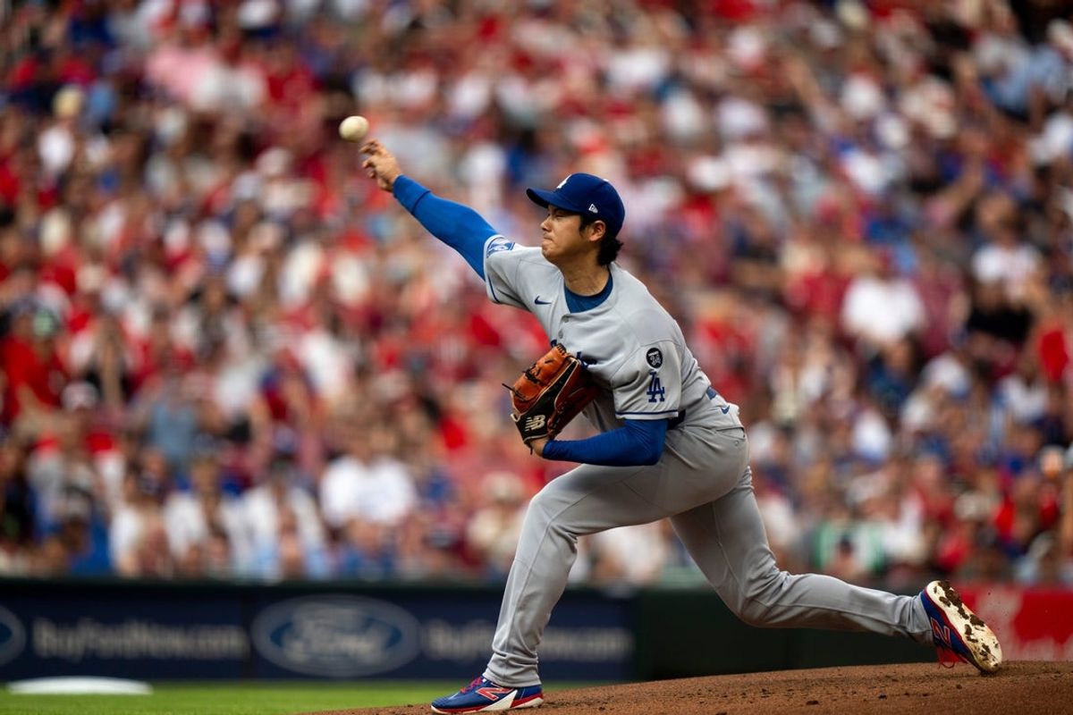 Los Angeles Dodgers designated hitter Shohei Ohtani (17) pitches in the first inning between Cincinnati Reds and Los Angeles Dodgers at Great American Ball Park in Cincinnati on July 30, 2025.
