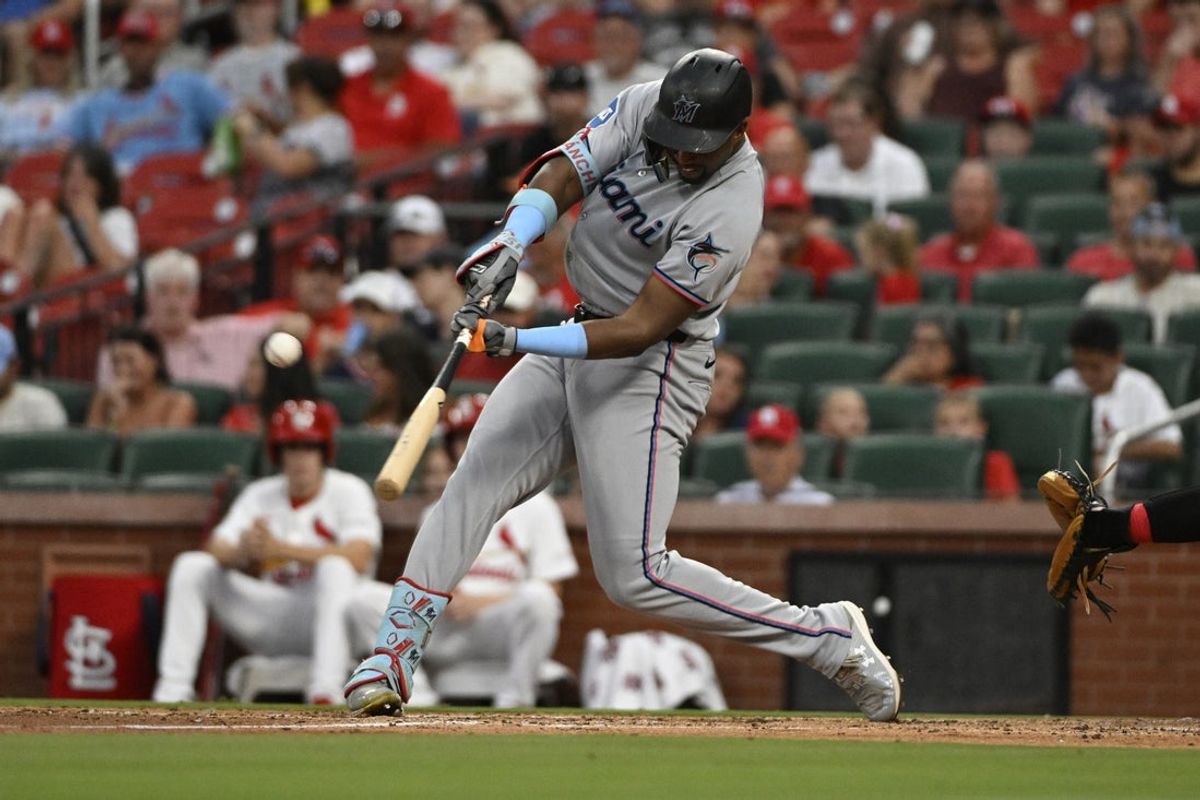 Jul 30, 2025; St. Louis, Missouri, USA; Miami Marlins outfielder Jesus Sanchez (7) hits a two-run home run against the St. Louis Cardinals during the third inning at Busch Stadium. Mandatory Credit: Jeff Le-Imagn Images