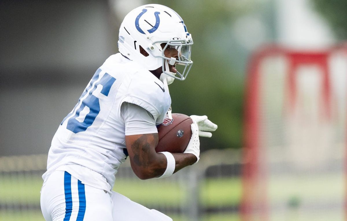 Indianapolis Colts running back Salvon Ahmed (36) runs Monday, July 28, 2025, during training camp held at Grand Park in Westfield.