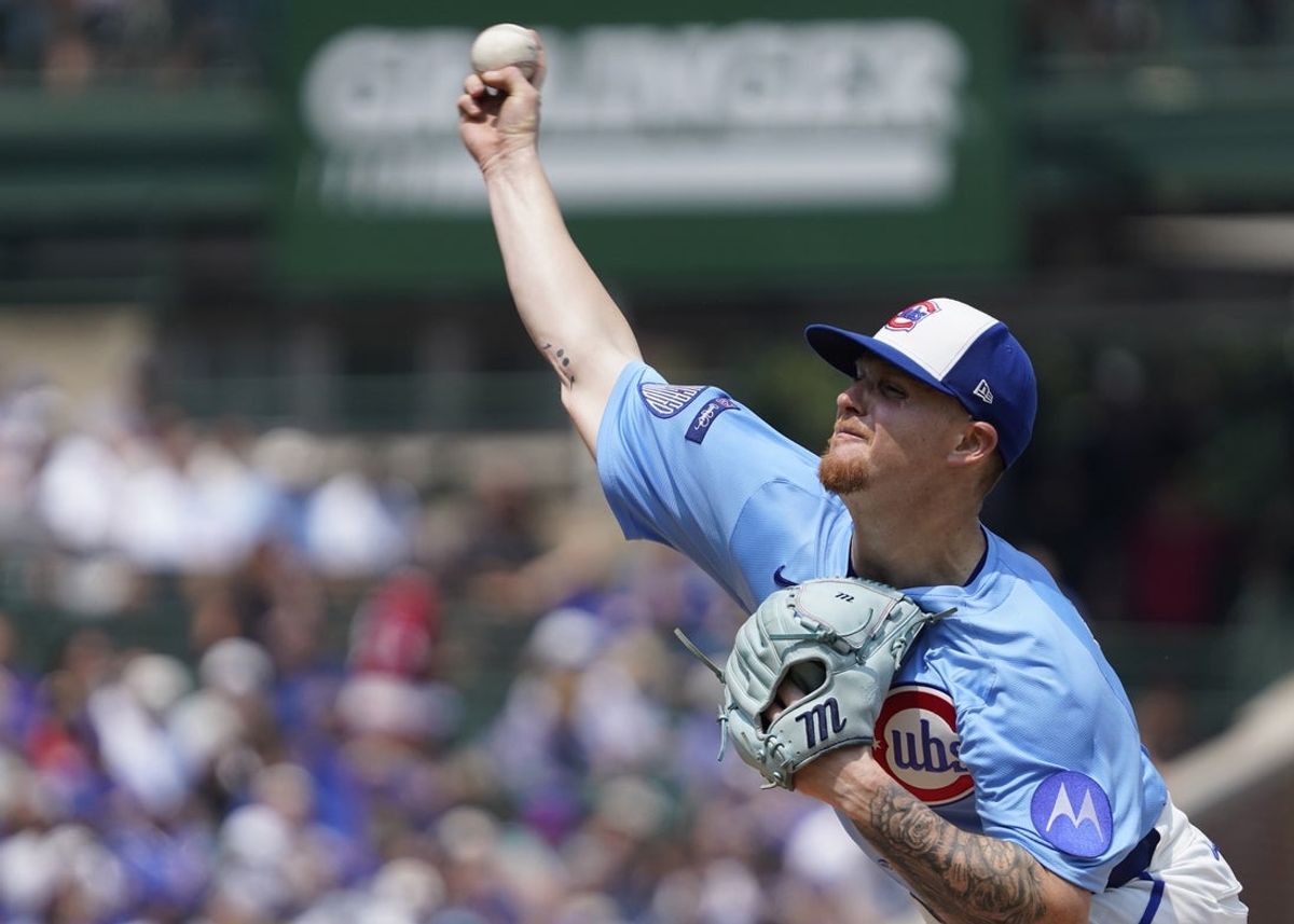 Aug 1, 2025; Chicago, Illinois, USA; Chicago Cubs pitcher Cade Horton (22) throws the ball against the Baltimore Orioles during the first inning at Wrigley Field. Mandatory Credit: David Banks-Imagn Images
