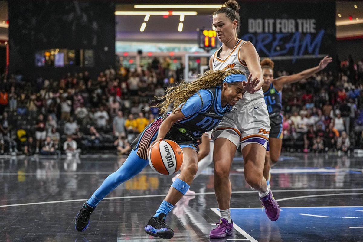 Aug 1, 2025; College Park, Georgia, USA; Atlanta Dream guard Jordin Canada (3) drives to the basket against Phoenix Mercury forward Kathryn Westbeld (24) during the first half at Gateway Center Arena at College Park. Mandatory Credit: Dale Zanine-Imagn Images