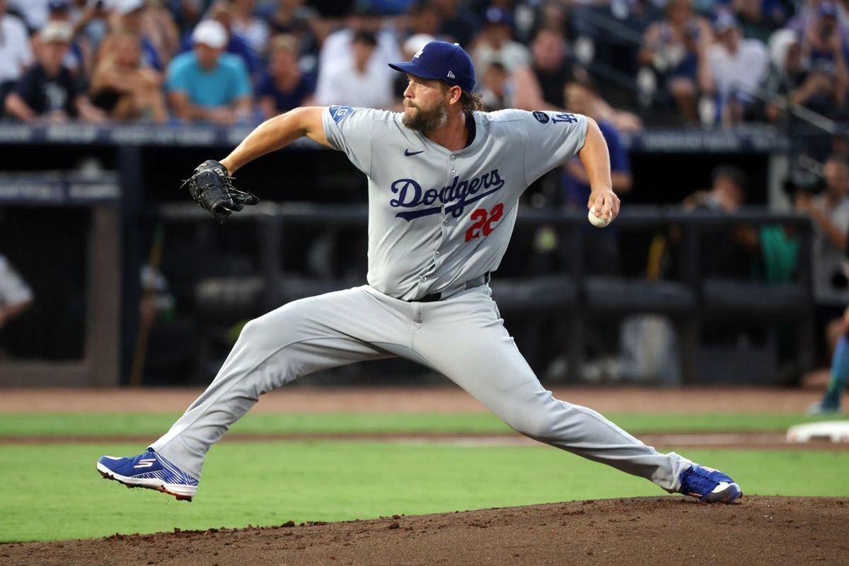 Aug 1, 2025; St. Petersburg, Florida, USA; Los Angeles Dodgers starting pitcher Clayton Kershaw (22) throws a pitch against the Tampa Bay Rays during the first inning at George M. Steinbrenner Field. Mandatory Credit: Kim Klement Neitzel-Imagn Images