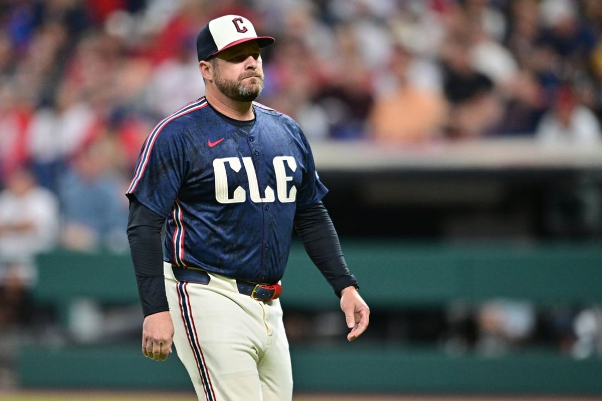 Aug 1, 2025; Cleveland, Ohio, USA; Cleveland Guardians manager Stephen Vogt (12) walks back to the dugout after a pitching change during the seventh inning against the Minnesota Twins at Progressive Field. Mandatory Credit: Ken Blaze-Imagn Images