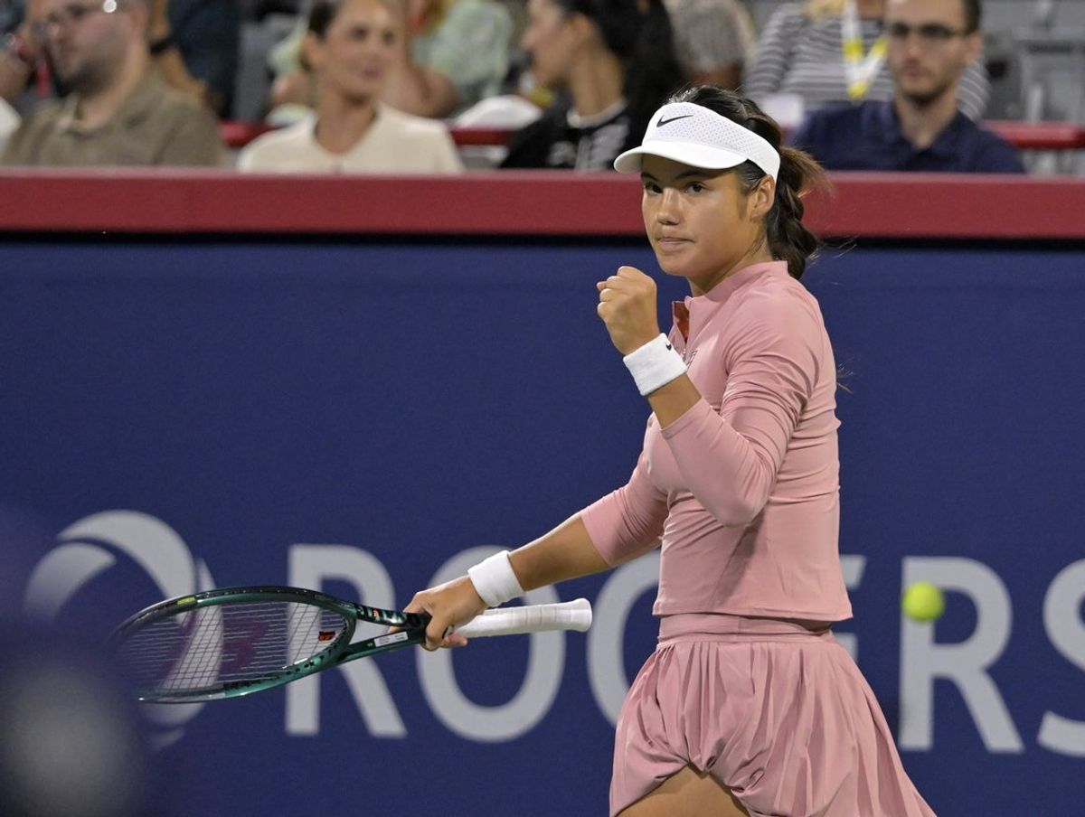 Aug 1, 2025; Montreal, QC, Canada; Emma Raducanu (GBR) reacts after a point against Amanda Anisimova (USA) in third round play at IGA Stadium. Mandatory Credit: Eric Bolte-Imagn Images
