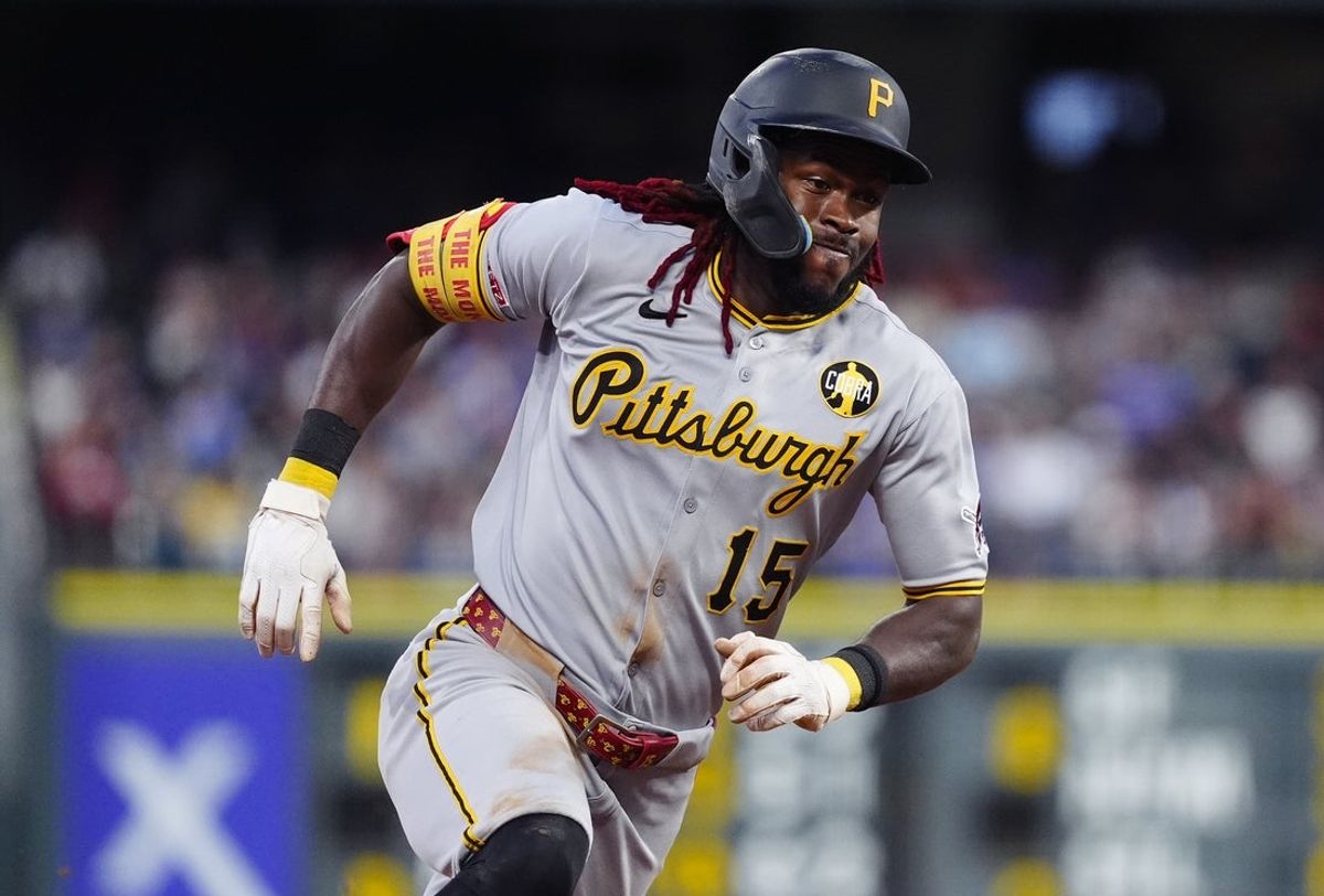 Aug 1, 2025; Denver, Colorado, USA; Pittsburgh Pirates center fielder Oneil Cruz (15) heads home to score a run in the fifth inning against the Colorado Rockies at Coors Field. Mandatory Credit: Ron Chenoy-Imagn Images