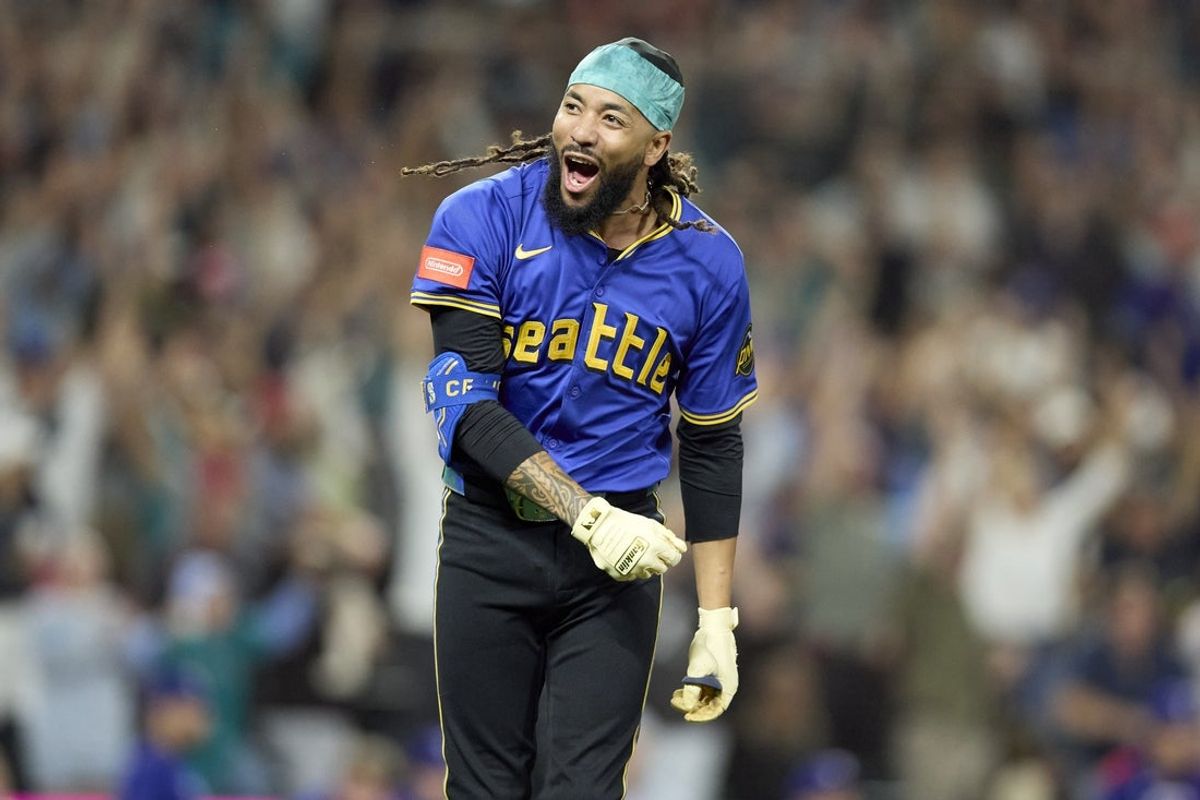 Aug 1, 2025; Seattle, Washington, USA; Seattle Mariners shortstop J.P. Crawford (3) hits a walk two-run home run off Texas Rangers pitcher Robert Garcia (62) at T-Mobile Park. Mandatory Credit: John Froschauer-Imagn Images