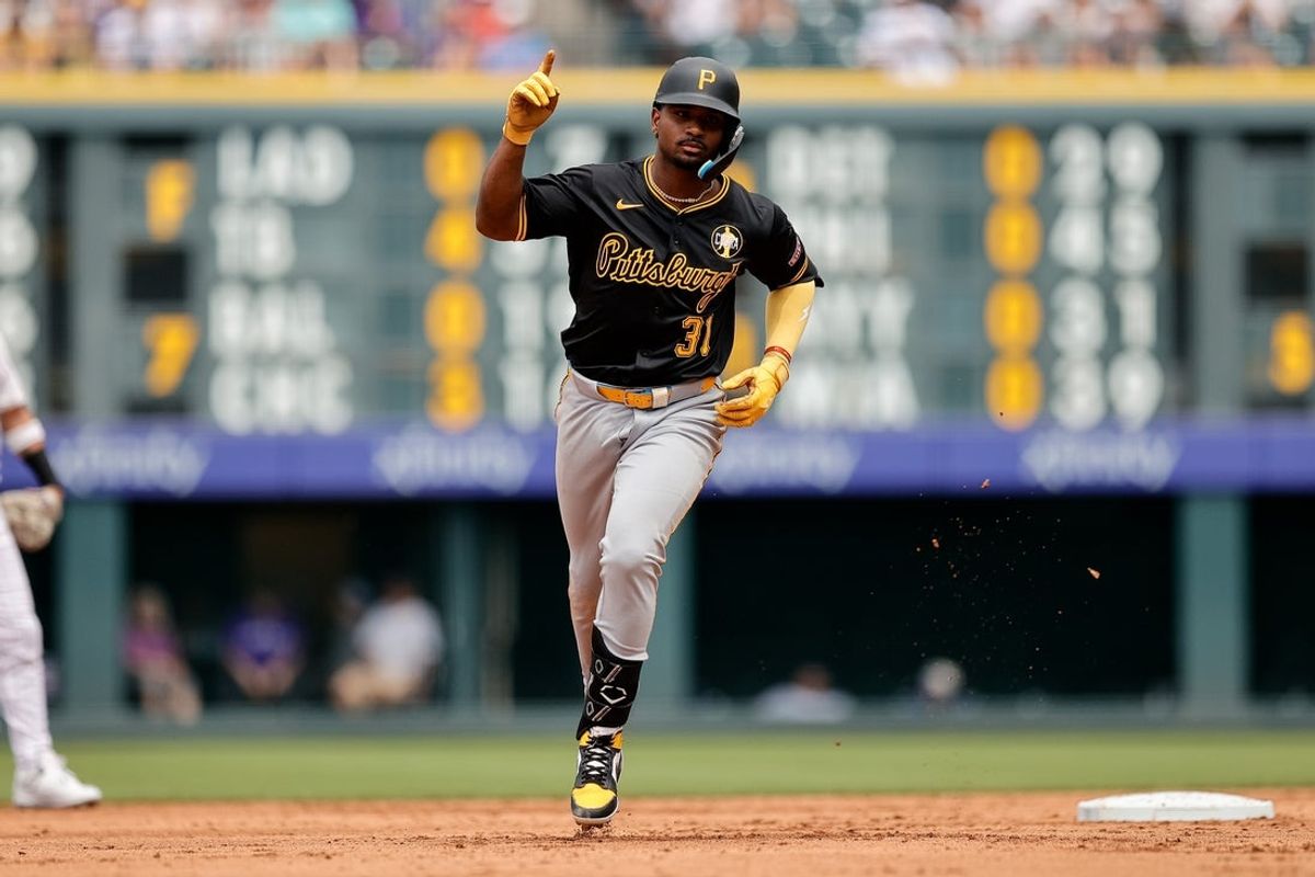 Aug 2, 2025; Denver, Colorado, USA; Pittsburgh Pirates first baseman Liover Peguero (31) gestures as he rounds the bases on a three run home run in the fifth inning against the Colorado Rockies at Coors Field. Mandatory Credit: Isaiah J. Downing-Imagn Images