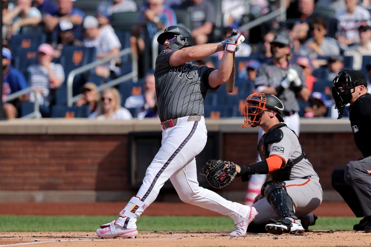 Aug 2, 2025; New York City, New York, USA; New York Mets first baseman Pete Alonso (20) follows through on a three run home run against the San Francisco Giants during the first inning at Citi Field. Mandatory Credit: Brad Penner-Imagn Images