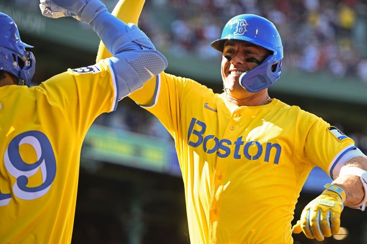 Aug 2, 2025; Boston, Massachusetts, USA; Boston Red Sox first baseman Romy Gonzalez (23) celebrates with right fielder Roman Anthony (19) after hitting a solo home run against the Houston Astros during the first inning at Fenway Park. Mandatory Credit: Brian Fluharty-Imagn Images